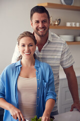 Fototapeta premium Love, portrait or couple in kitchen with cooking, bonding together or connection in wellness activity. Happiness, partner or people at home with meal, support or romantic moment in culinary hobby.