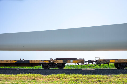 Wind turbine blade being moved by rail flatcar