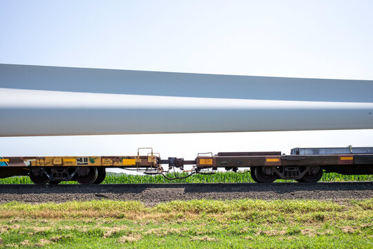 Wind turbine blade being moved by rail flatcar