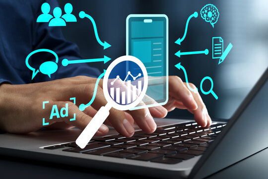 SEO-friendly web design and web analytics. Search engine optimization and user interface strategy. Businessman using laptop computer to develop mobile site.