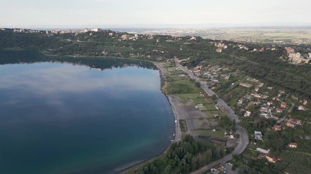 Cinematic aerial footage unveils a natural landscape of a volcanic lake sitated in Alban hills in Lazio province of Italy.