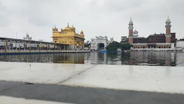 Beautiful view of Golden Temple - Harmandir Sahib in Amritsar, Punjab, India, Famous indian sikh landmark, Golden Temple, the main sanctuary of Sikhs in Amritsar, India