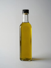 Glass Bottle Filled With Golden Olive Oil On A Plain White Background, Minimalist Design