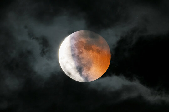 Total lunar eclipse, a stunning blood moon and celestial phenomenon in the night sky 