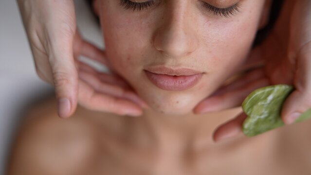 Professional esthetician provides soothing skincare service