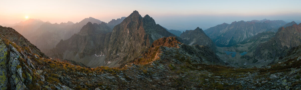 Panoramic view of High Tatras peaks from Rysy summit during sunrise, Slovakia