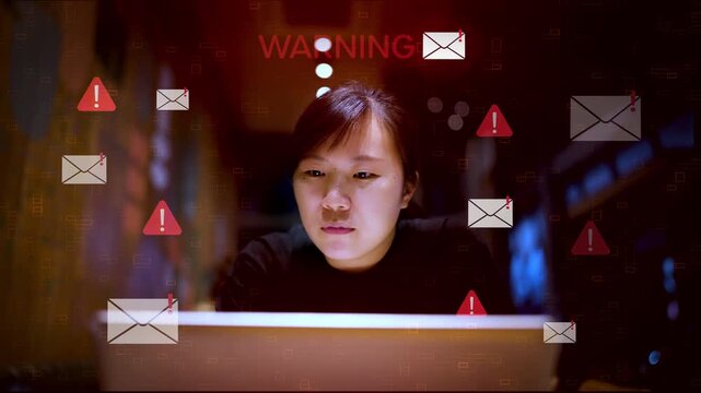 Asian woman looking stressed and worried about cyber security threats and phishing email warnings on laptop screen, digital data overload and online scam concept in dark office background.