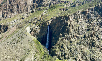 High nameless waterfall in Chulyshman valley, Altai, Russia