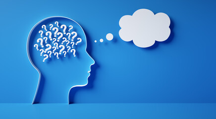 Conceptual artwork showing a 3D silhouette of a head with heap of question marks and thought bubble against blue wall	