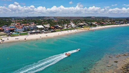 Obraz premium Fantastic aerial view of Barra de Sao Miguel beach on a sunny summer day in February 2026 near Maceio City. Alagoas State, Brazil 