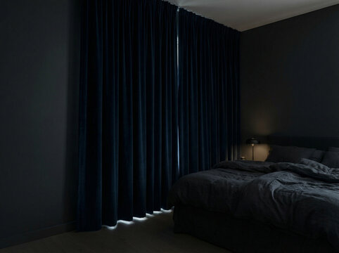 Room with blackout curtains closed in dark interior design  
