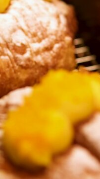 croissant with mango and powdered sugar