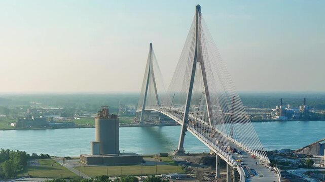 Aerial drone view 14 October 2025 of Gordie Howe International Bridge over Detroit River linking Detroit and Windsor, highlighting modern cable-stayed engineering and cross-border connectivity.
