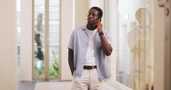 Serious, man and phone call in office, talk and discussion with contact for pr meeting and schedule. Creative, publicist and black person with mobile for communication and consultation with tech