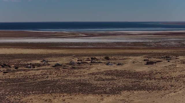 Aerial view of an abandoned desert village near a salt Aral sea, Kazakhstan