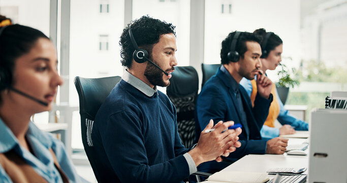 Virtual assistant, staff and man with technology in call center, customer care and communication. Troubleshooting, online advice or help desk agent consulting with client, headset or people coworking