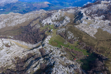 Fototapeta premium Aerial view from a drone of Mount Mortillano in the karst massif of the Sierra de Hornijo. Collados del Asón Natural Park. Soba Valley. Pasiegos Valleys. Cantabria. Spain. Europe