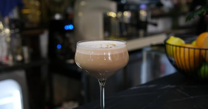 Foamy almond cocktail kulhad of Milk lassi prepared in an Indian hotel