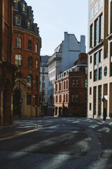 Fototapeta premium Urban Street with Historic Brick Buildings