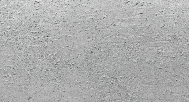 Textured cement mortar plaster application on lightweight concrete wall for building finish
