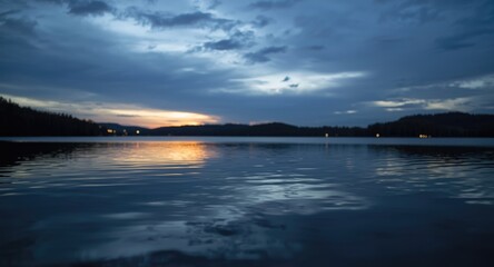 Obraz premium peaceful twilight reflecting on smooth lake surface