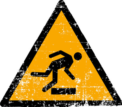 Grunge tripping hazard warning sign worn scratched ISO 7010 W007 symbol