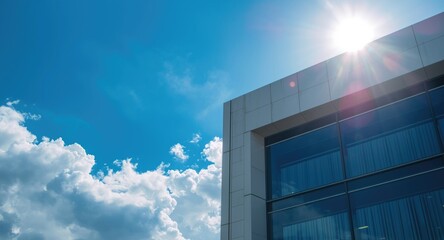 Fototapeta premium office building facade with vibrant blue sky background