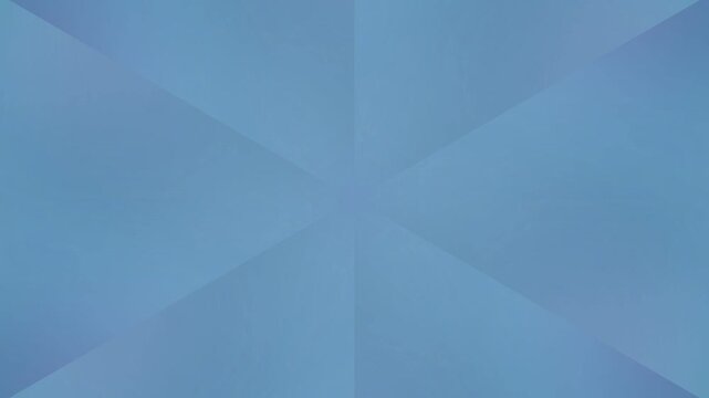 Geometric pattern forming a blue abstract design with triangles and shapes