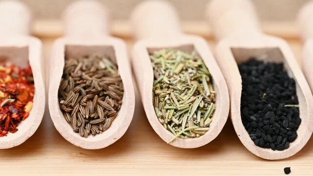 capturing a diverse collection of aromatic dried spices, including pungent chili flakes