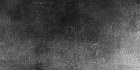 Obraz premium A dark aged concrete wall texture provides a vintage grey grunge backdrop with a dirty rough surface design for an old blank paper wallpaper pattern
