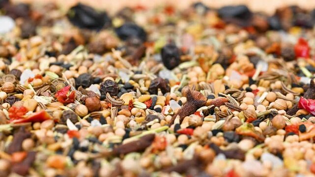 capturing a diverse collection of aromatic dried spices, including pungent chili flakes