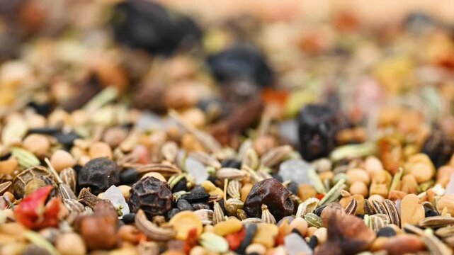 capturing a diverse collection of aromatic dried spices, including pungent chili flakes