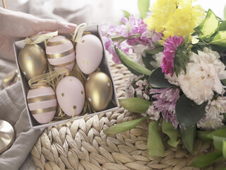 Pastel Easter Eggs Beside Fresh Spring Flowers