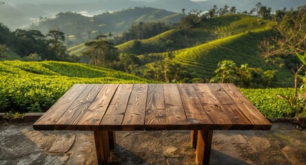 Fototapeta premium reclaimed wooden table with textured surface overlooking vibrant green tea plantation terraces