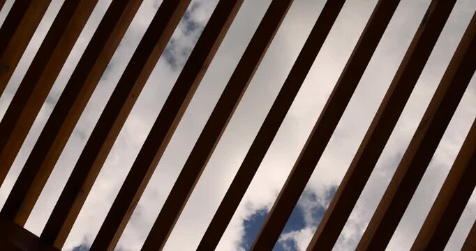 part of a wooden frame building under construction on the beach to create a good infrastructure for recreation, a canopy made of planks