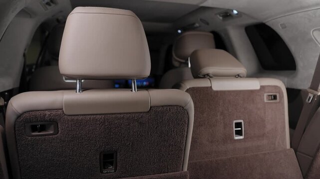 The rear seat of the car folds down. 