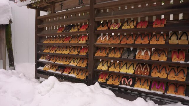 Kinosaki Onsen, Wooden Geta Available for Tourists in Snowy Onsen Town, Japan