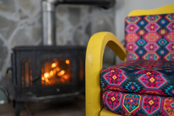 Detail of a colorful rustic armchair with Slavic ornaments.