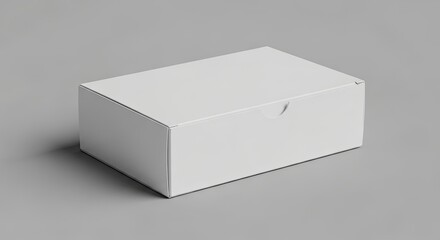 Naklejka premium Crisp white rectangular cardboard box offering a clean and versatile canvas for minimalist product branding and corporate identity