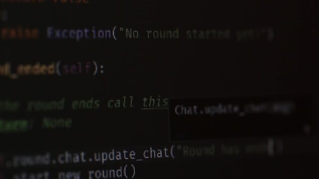 Program code on the monitor screen is close, the programmer writes code, IT and programming