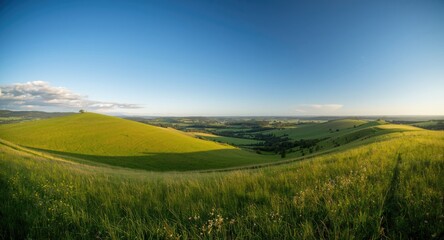 Wide angle capture of gently sloping hills and broad valleys