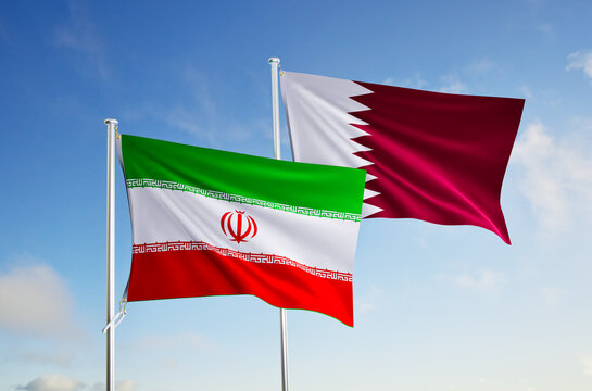 flags of iran and qatar over blue sky background.