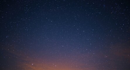 Fototapeta premium Twilight backdrop revealing a celestial sky scattered with brilliant stars
