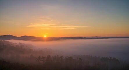 Fototapeta premium Sun dog light phenomenon creating rainbow colors over a foggy morning landscape