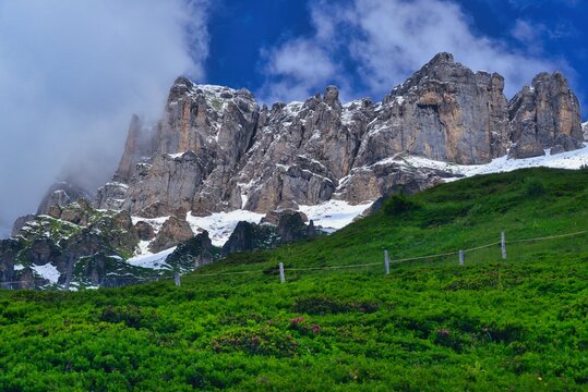 Snow melting in an alpine landscape in summer, Obere Balm, Klausen pass, Uri, Switzerland