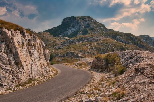 Winding alpine road through the Durmitor mountain in summer, Durmitor National Park, Montenegro