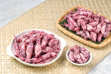 Obraz premium Cumi asin (Indonesian salted squid), a traditional preserved seafood ingredient commonly used in Indonesian cuisine. 