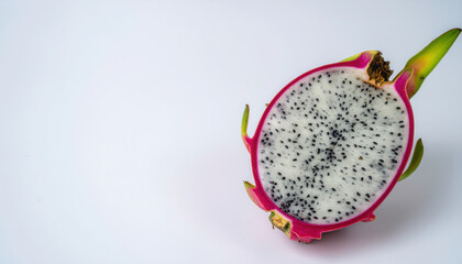 Dragon fruit sliced open on clean background