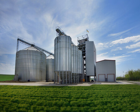 metal silos for storage, grain elevator complex for receiving, cleaning, drying and long-term storage, norias for lifting grain and a working tower