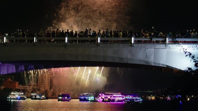 Festive Fireworks Over Downtown City Lights